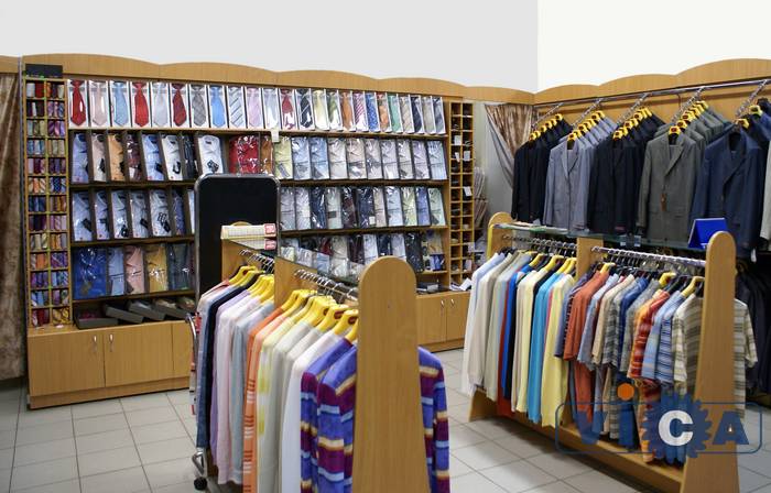  Напольные стеллажи 12 серии торговой мебели Двина используются для оформления магазинов одежды, в  том числе рубашек и галстуков.